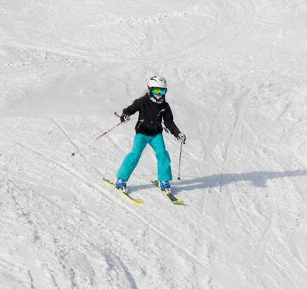 young skier on slopes at bromley mountain